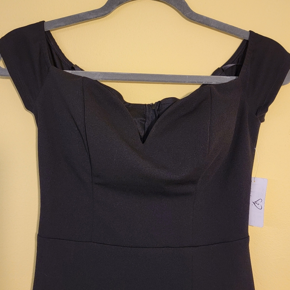 Long dress in black, small size, double fabric. Dressed with slash in front